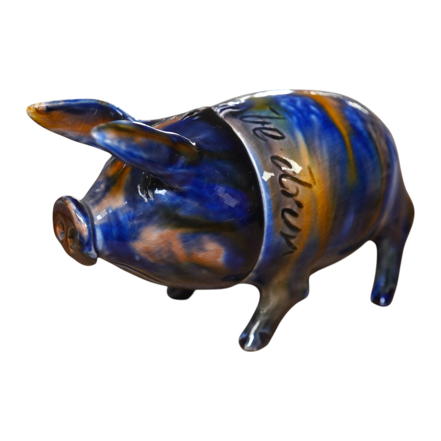 A Rye Pottery lustre glazed pig with detachable head, incised “Wunt Be Druv”, 9cm wide. Condition - fair